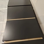 Matte Black Sideboard with Six-Panel Front, Stainless Steel Accents Three Drawers and Interior Shelves